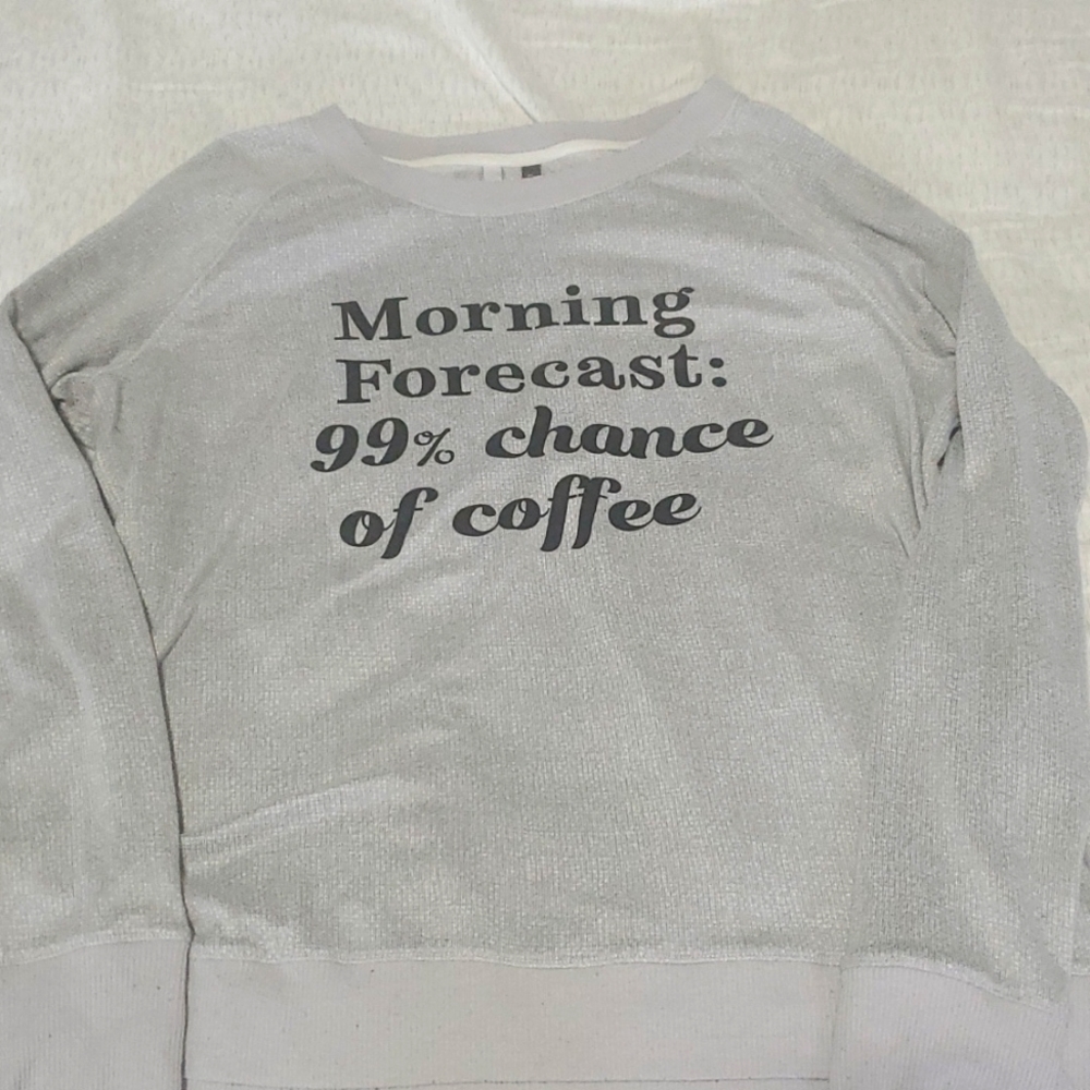 Long sleeve light grey pajama shirt.